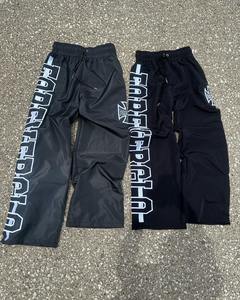 Pantalones bordados personalizados con logotipo de serigrafía para hombre, pantalones informales holgados impermeables, cortavientos de poliéster 100%, pantalones de chándal de nailon - Product Image 4