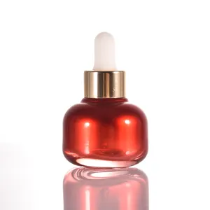 Frasco conta-gotas de vidro vermelho luxuoso de 30ml, frasco de óleo cosmético para essência líquida de soro com tampa dourada