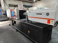 Machine de moulage par injection plastique verticale Jetmaster 2024, bon état de marche, JM 128 tonnes, petite machine à pompe