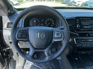 Honda Ridgeline Trail-Sport AWD 2024 d'occasion noire avec jantes en alliage foncées, sièges en cuir, transmission automatique, navigation, sièges chauffants et télécommande - Product Image 4