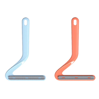 2025 vente chaude créatif nouveau Design Golf forme Double face toilettage pour animaux de compagnie épilation brosse vêtements grattoir