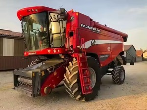 Moissonneuse-batteuse compacte New Holland CX7090 d'occasion, 10 rangs, transmission par engrenages, stock disponible, caractéristiques haut de gamme, livraison rapide - Product Image 4