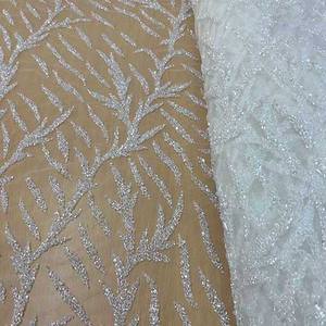 <b>White</b> Bridal Crystal <b>Sequins</b> Heavy Beaded Fabric <b>White</b> Lace Wedding <b>Dress</b> Fabric Manufacturer and Supplier From India - Product Image 1