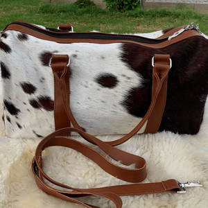 Wholesale Supplier New Style Cowhide Duffle <b>bags</b> High Quality Material Available In Reasonable Prices Cowhide Duffle <b>bags</b> - Product Image 2