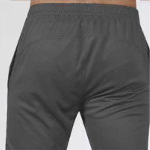Pantalones informales transpirables unisex para correr, pantalones de chándal de LICRA de buena calidad con bolsillos con cremallera - Product Image 4