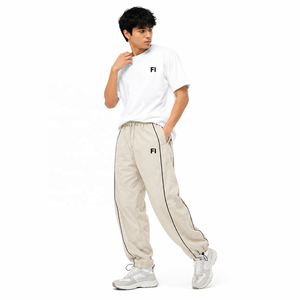 Pantalones de hombre al por mayor con cintura elástica, corte relajado, ribete en contraste, ligeros, estilo casual urbano, pantalones personalizados, proveedor de EE. UU. - Product Image 4