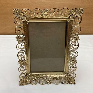 Stylish finish metal photo <b>frame</b> suitable <b>for</b> bright interiors adding warmth and inviting decorative appeal to homes - Product Image 4