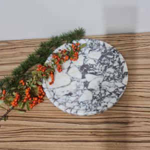 Bandeja de mármol de diseño redonda única con acabado elegante, ideal para servir el centro de mesa de decoración de tocador y una elegante pantalla de mesa - Product Image 1