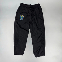 Chaqueta y pantalones de chándal de nailon a prueba de viento impermeables reflectantes de gran tamaño con cremallera de poliéster personalizados Conjunto unisex de chándal de nailon