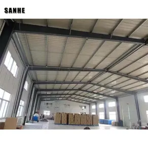 Prefab metal structure used for industrial or commercial purposes.