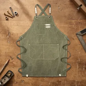 Tablier de travail classique en toile verte sans manches avec plusieurs poches, robuste, réutilisable et durable pour l'atelier - Product Image 1