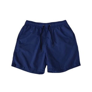Nouveaux shorts de plage confortables à séchage rapide pour hommes maillots de bain en soie avec cordon de serrage élastique à la taille motif solide - Product Image 3