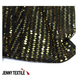 Tela Textil Premium Elástica de Alto Brillo con Tejido Artesanal Trans Spangle de Corea, 88% Nailon 6, 6% Spandex Metálico, para Costura y Decoración - Product Image 1