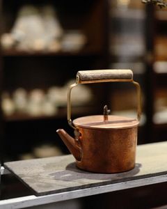 Hervidor de cobre de calidad Heirloom con textura artesanal y tamaño práctico hecho para amantes del té y temas de cocina vintage - Product Image 3