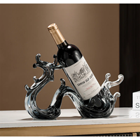 Porte-bouteilles à vin vintage en or flamme de luxe |   Porte-bouteille de vin en métal artistique, support de rangement à vin moderne et sculptural pour table, pour les fêtes
