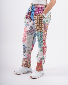 Pantalones bombachos de retazos para todas las estaciones con decoración elástica, ropa holgada para festivales de verano, pantalones de verano al por mayor con bolsillos - Product Image 1