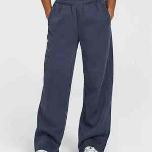 Bas prix Pantalon large d'hiver pour femmes Polyester/coton Matériau respirant Dentelle Logo personnalisé Impression solide OEM régulier - Product Image 1