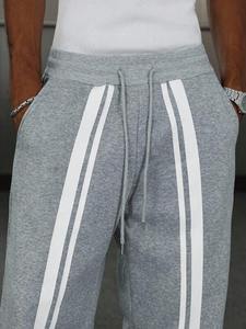 กางเกงกีฬาผู้ชายโอเวอร์ไซซ์โอเวอร์ไซซ์ใส่วิ่งตามสั่งสีขาวลายทางใส่สบายเอวยางยืดในเมืองฮิปฮอป - Product Image 5