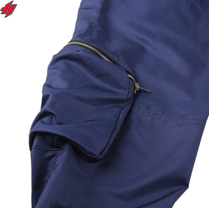Pantalon coupe-vent de haute qualité avec logo brodé et conception personnalisée Pantalon en nylon en polyester pour hommes Pantalon en nylon à panneaux en bas de vêtements de rue pour hommes - Product Image 3