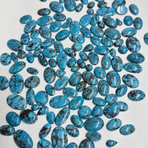 Piedras de cabujón sueltas de forma ovalada turquesa de magnasita azul Natural de grado AAA de alta calidad para la fabricación de joyas precio al por mayor - Product Image 1