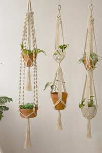 Jardinière en corde macramé artistique pour suspendre un pot de fleurs, ajoutant un charme artisanal à l'intérieur de la maison - Product Image 6