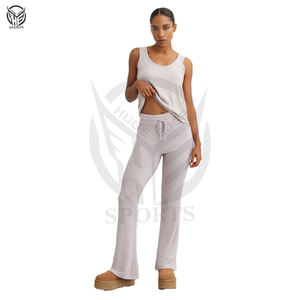 Servicio OEM, el mejor diseño, precio al por mayor, material súper suave y cómodo, material premium, pantalones acampanados para mujer. - Product Image 1