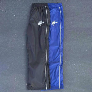 กางเกงกันลมไนลอนออกแบบได้ตามต้องการสำหรับผู้หญิงกางเกงวอร์มผ้าเย็บปะติดด้านข้างกางเกงไนลอนน้ำหนักเบา - Product Image 3