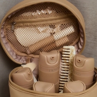 Nouveau design de sac de maquillage rond en cuir PU végétalien recyclé personnalisé sac de courtoisie de voyage essentiel avec poches élastiques