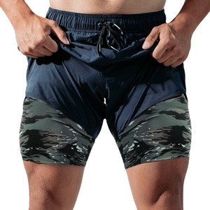 Pantalones cortos de gimnasio de calle alta para hombre, Bermudas sólidas transpirables de poliéster y LICRA con dobladillo dividido activo con logotipo personalizado para Fitness deportivo - Product Image 5
