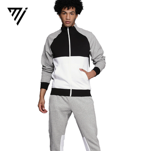 ชุดแทรคสูทผู้ชายแบบมีซิป สีสันตัดกัน สไตล์สตรีทแวร์ แจ็คเก็ตและกางเกงจ็อกเกอร์ สำหรับฤดูหนาว สวมใส่สบาย ผลิตโดย Marfa International - Product Image 1