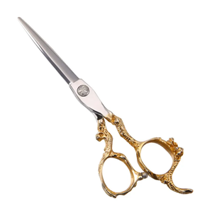 Proveedor de tijeras de corte de pelo de peluquero Tijeras de peluquería con mango de dragón grabado en oro - Product Image 3