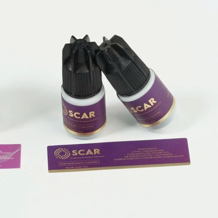 Set of 2 purple OSCAR bottles