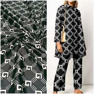 Muestras gratuitas de material de algodón para vestidos y vestidos de mujer en blanco y negro, ofertas de prendas al por mayor - Product Image 1