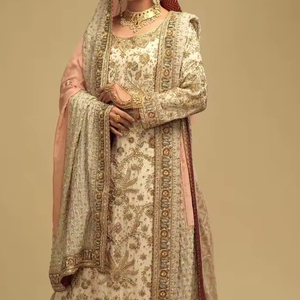 Superbe broderie lourde sur 2024 mariée longue Kurta Lehenga robe en soie ornée de perles de verre en cristal Dabka travail pour les mariages - Product Image 1