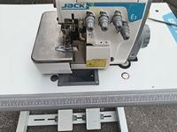 Machine à coudre industrielle surjeteuse à entraînement direct à quatre fils JACK E3-4 d'occasion
