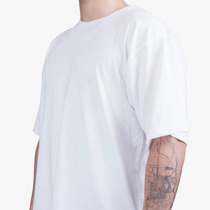 เสื้อยืดโอเวอร์ไซส์สีขาวคุณภาพสูง ยูนิเซ็กซ์ ผ้าฝ้าย 100% แขนสั้น ระบายอากาศได้ดี ผลิตในตุรกี ผู้จัดจำหน่ายขายส่ง - Product Image 1