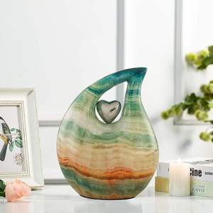 Urna de cremación en forma de lágrima de metal sólido Diseño moderno único para cenizas Corazón amoroso y urnas funerarias conmemorativas - Product Image 5