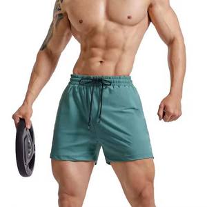 Pantalones cortos de entrenamiento de algodón 100% para hombre, pantalones deportivos de patrón sólido para gimnasio, pantalones deportivos con bolsillos en la cintura con cordón, pantalones cortos para correr al por mayor - Product Image 3