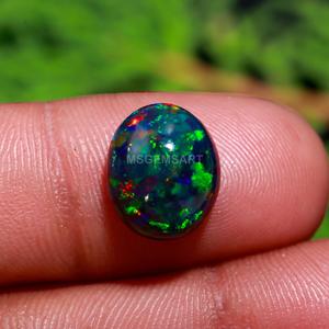 โอปอลควันสีดํา Cabochon 12x10 มม.เกรด AAA + สีดําเอธิโอเปียโอปอลรูปไข่สําหรับทําเครื่องประดับขายส่งจํานวนมาก - Product Image 2