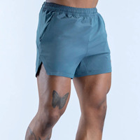 Shorts d'entraînement pour hommes en polyester gris ardoise, sans couture, avec logo personnalisé OEM en gros, taille élastique pour l'entraînement en salle de sport