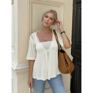 Top de punto de ganchillo con cuello en V y manga corta color albaricoque para mujer con peplum y lazo frontal - Product Image 5