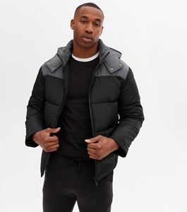 Chaqueta acolchada negra personalizada al por mayor con capucha de bloque nuevo diseño de calle de moda para el invierno - Product Image 1