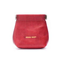 Vente en gros de mini porte-monnaie en cuir vintage Portefeuille compact fait main à fermeture à pression gaufré soleil de créateur