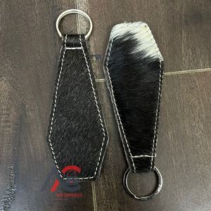 ที่หนีบหมวกหนังวัวแท้คุณภาพสูงแบบแม่เหล็กสำหรับกิจกรรมกลางแจ้ง ที่หนีบหมวกหนังแท้สำหรับเดินทาง ใช้ได้ทั้งชายและหญิง - Product Image 1