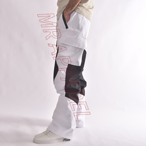 Pantalones de esquí blancos con paneles de contraste negros Pantalones de nieve impermeables con dobladillo elástico de cintura ajustable y forro polar cálido - Product Image 3
