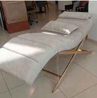 Table de massage pliable moderne en fer réglable de luxe pour salon de beauté, portable et commerciale