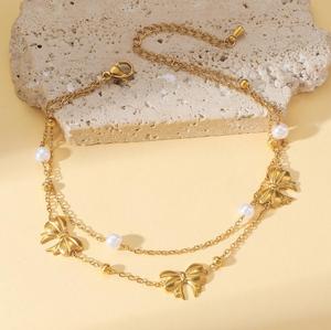 Tobilleras de Moda con Diseño Exclusivo Recién Desarrollado, Chapadas en Oro, de Acero de Titanio, con Lazo y Perla - Product Image 3