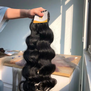 Extensiones de cabello Remy humano crudo 100%, paquete de ondas profundas sueltas de doble donante vietnamita con desprendimiento gratuito - Product Image 1