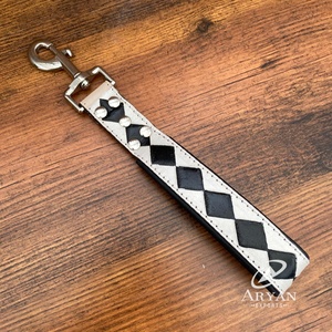 สายจูงสุนัขแบบสั้นสีดำและสีขาวหนังแท้ใหม่เชือกฝึกสุนัขพร้อมที่จับแบบนุ่ม - Product Image 1