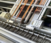 Machine à plastifier entièrement automatique à grande vitesse pour carton Machine à plastifier à flûte avec empileur intégré